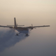 This photo shows a Twin Otter flies out of the South Pole on a previous medical flight in 2003. (National Science Foundation via AP/Jason Medley)